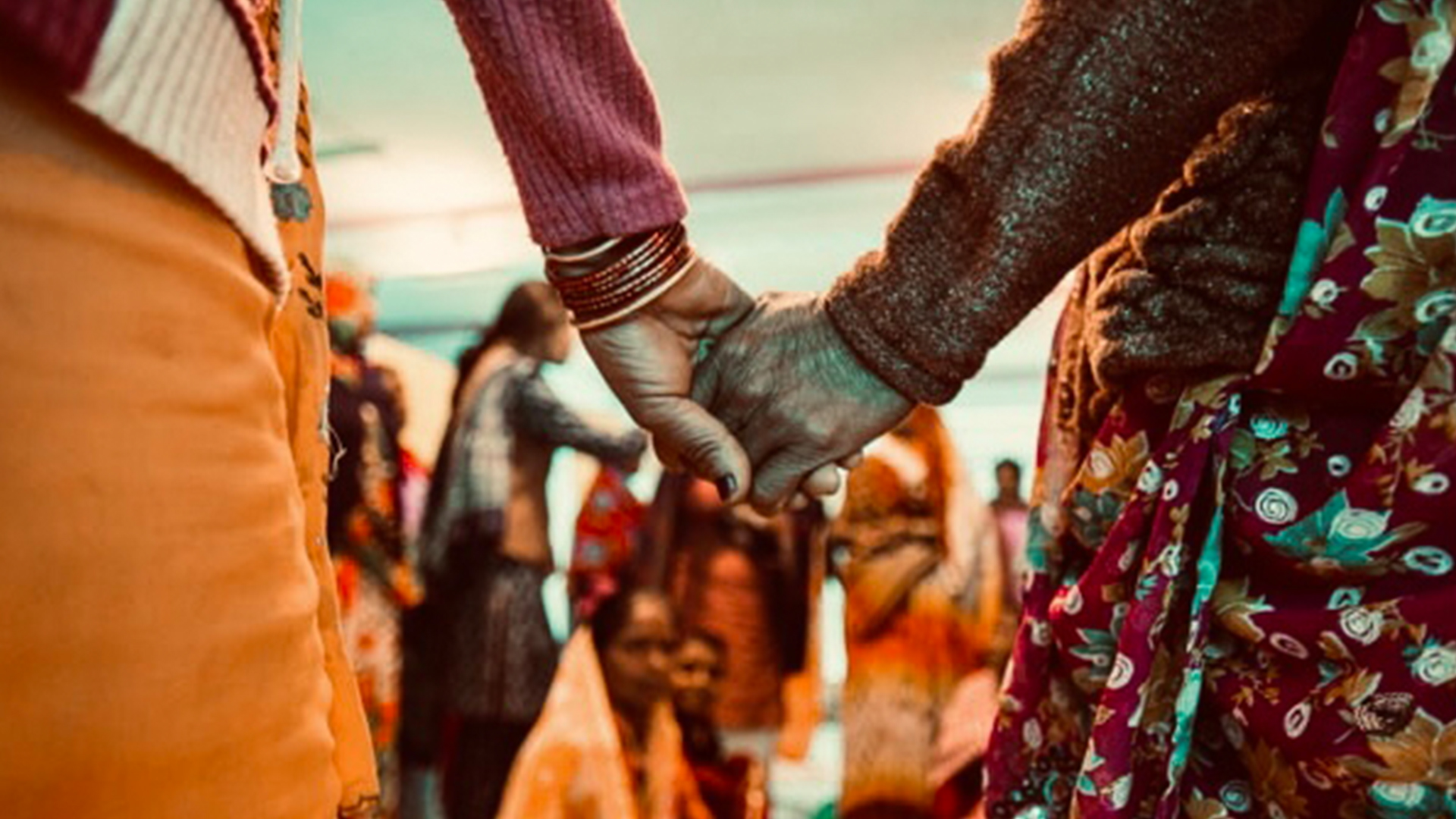 women holding hands