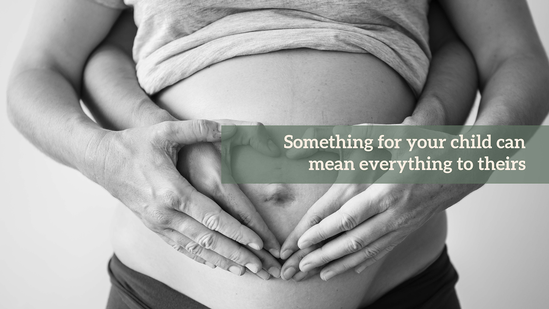 hands on pregnant stomach